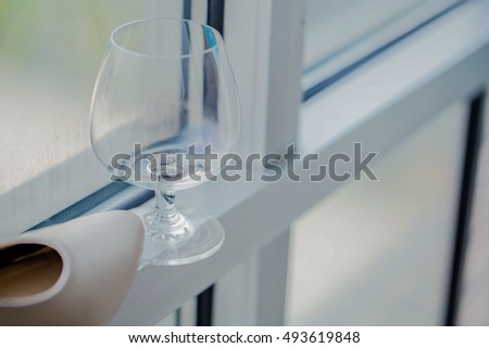 Wedding ring is placed on the glass.