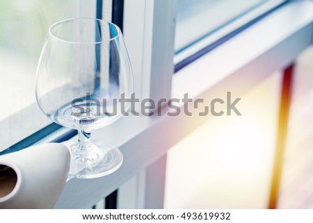 Wedding ring is placed on the glass.