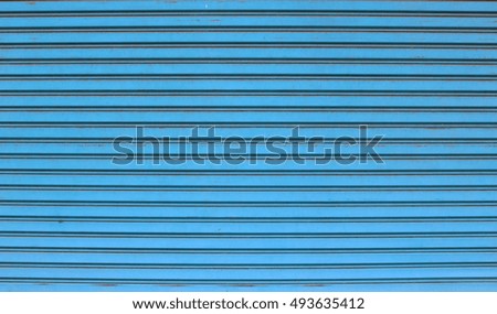 Background of old blue metal door
