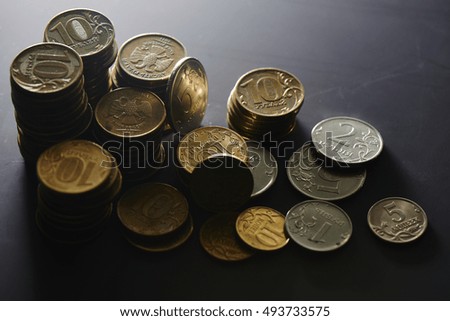Russian iron coins lay on the dark surface closeup