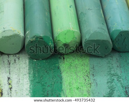 green artistic crayons