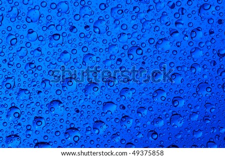 Dark blue background with water drops