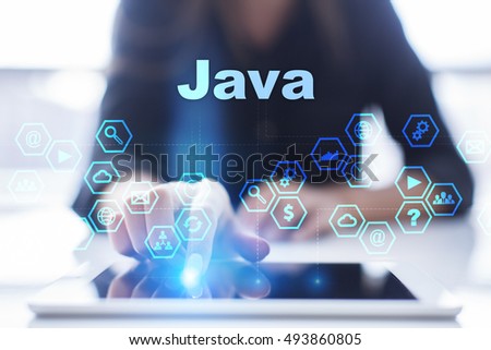 Woman is using tablet pc, pressing on virtual screen and selecting "Java".