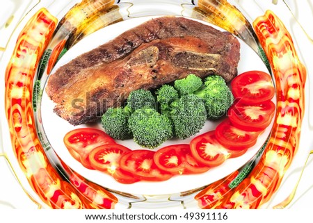 roast steak and raw uncooked vegetables