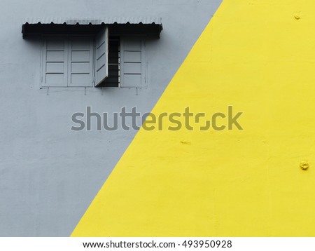 gray and yellow paint color wall background