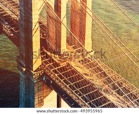 Brooklyn Bridge over the East River in New York City at sunset
