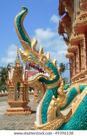 Buddhist temple sculpture of dragon in Wat Plai Laem temple (Koh Samui, Thailand)