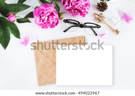 Cute vintage photography with flowers, petals an leaves Flat lay top view mockup. Minimalistic photo for blogs, websites, social media platforms.