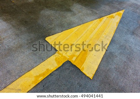 Yellow arrow, Yellow straight sign on asphalt way, Direction arrow.