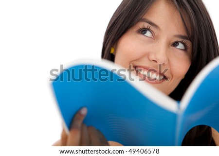 Pensive female student with a notebook - isolated over white