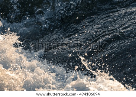 running splashing water closeup