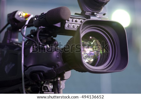 Professional digital video camera. accessories for 4k video cameras.
tv camera in a concert hall.  Royalty-Free Stock Photo #494136652