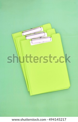 A studio photo of an office binder clipboard