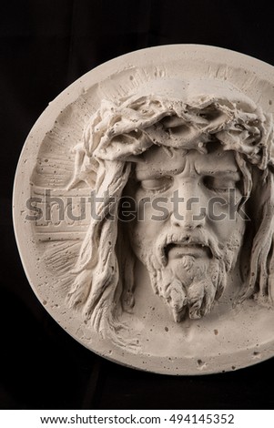 plaster painting portrait of Jesus Christ in a crown of thorns