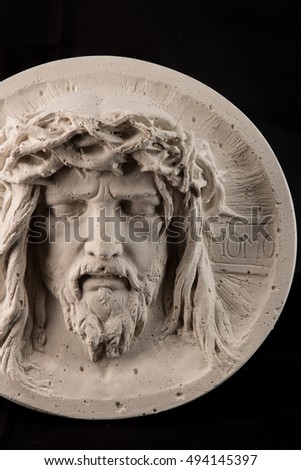 plaster painting portrait of Jesus Christ in a crown of thorns