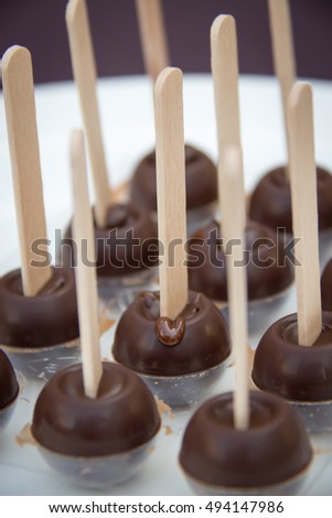 Blurred image for background of festive chocolate cake pops prepare for dress