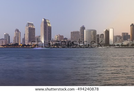 San Diego skyline sunset and twilight transition with waterfront of the pacific ocean
