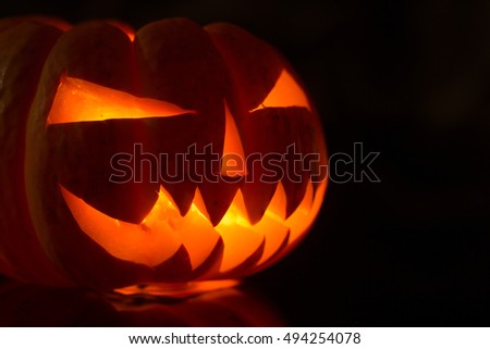 
Halloween pumpkin monster scary face lantern.