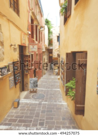 Defocused background of a traditional street in the old town of Chania. Intentionally blurred post production for bokeh effect.
