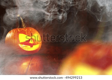 halloween pumpkin on desk and smoke decoration 