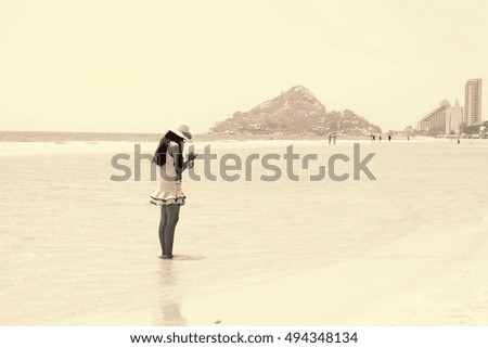 woman  on the beach in summer.