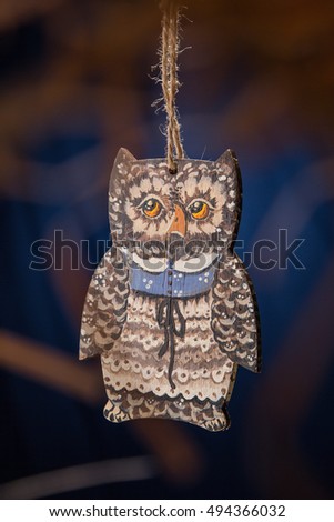 Owl in a dress. Picture of wooden toys are hand-painted personally.