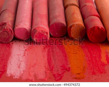 red artistic crayons