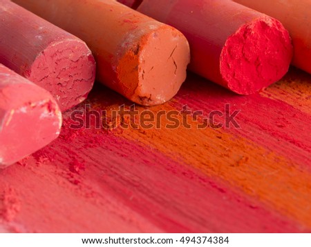 red artistic crayons