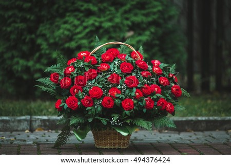 incredible large basket of red roses