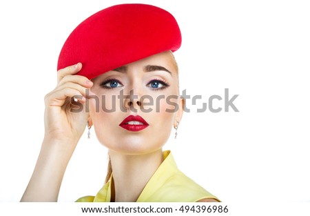  close  up portrait of a girl in a red hat