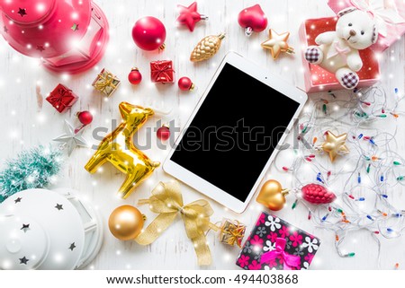 Christmas and Happy new year decoration flat lay on white wooden board background snow filter, festival concept