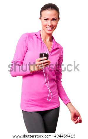Woman in fitness clothing with mobile phone  earbuds on white