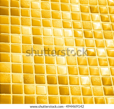Modern glass mosaic tiles background, small mosaic texture, yellow mosaic in bathroom, high quality resolution