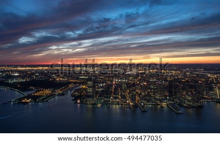 New Jersey City skyline with urban skyscrapers at sunset. 
Photo taken from freedom tower Ground Zero observatory