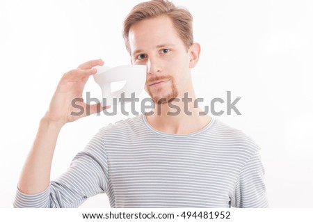 Young adult male striking a dramatic pose unmasked isolated on white background. Royalty-Free Stock Photo #494481952