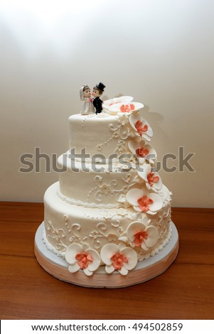wedding cake dessert with orchids mastic