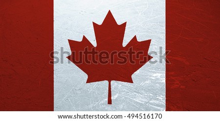 A Canadian flag stamped onto the surface of an ice rink.
