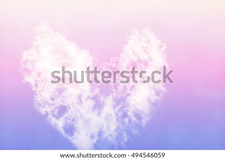 Cloud heart shape with pastel color soft blur background.