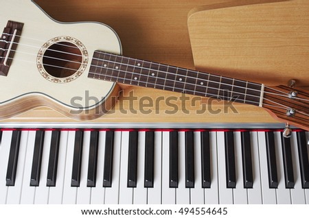 Piano keyboard and guitar.