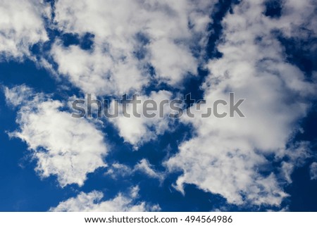 background of the blue sky and some clouds