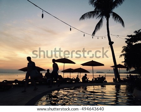 Chilling sunset and waiting for full moon party at swimming pool, Koh Pha Ngan, Surat Thani, Thailand.