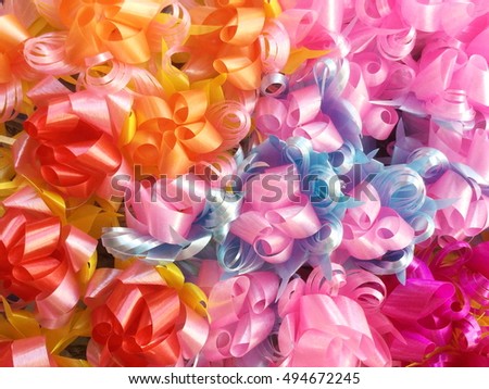 Colorful ribbons with bows background