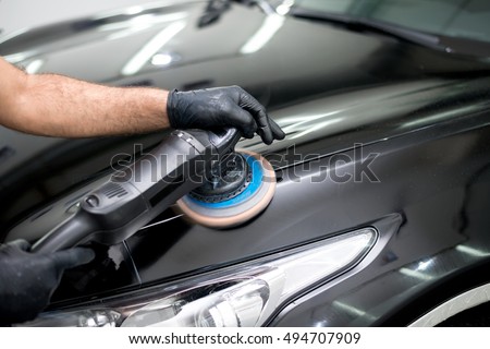 Polished black car polishing machine polished finishing Royalty-Free Stock Photo #494707909