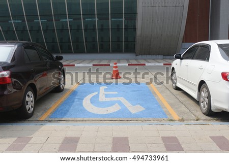 slot empty space parking with sign for people with disabilities