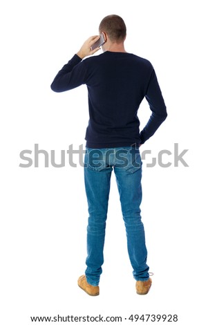 Back view of  pointing young men talking on cell phone. Young guy  gesture. Rear view people collection.  backside view of person.  Isolated over white background. A guy in a black sweater talking on