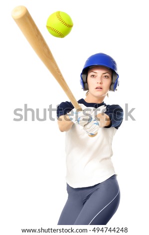 Young Woman Softball Player batting on White