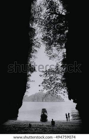 People exploring one of the many lonely beaches in the Andaman sea, Thailand, Asia