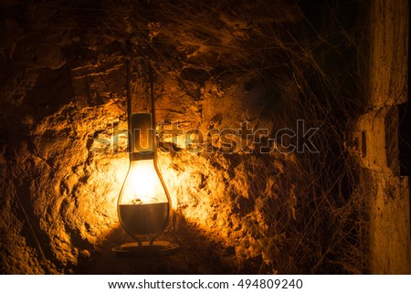 kerosene lamp in cellar