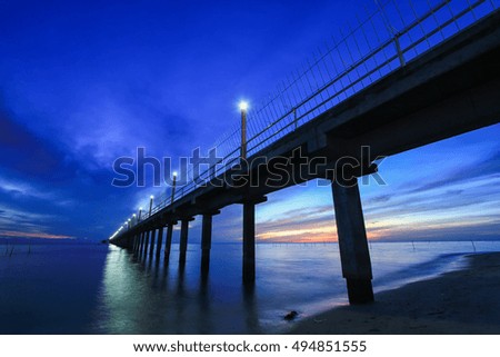 Colorful sky and colorful water in lake reflected in morning time before sunrise,Select focus with shallow depth of field,Soft focus,noise and grain due long exposure:ideal use for background