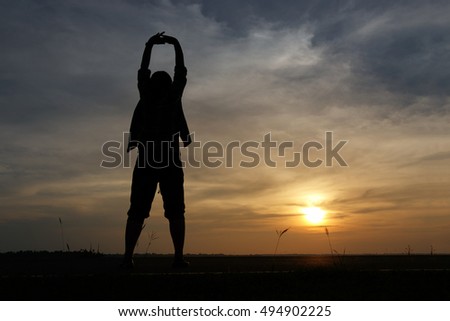 Silhouette woman lifestyle relax at sunset